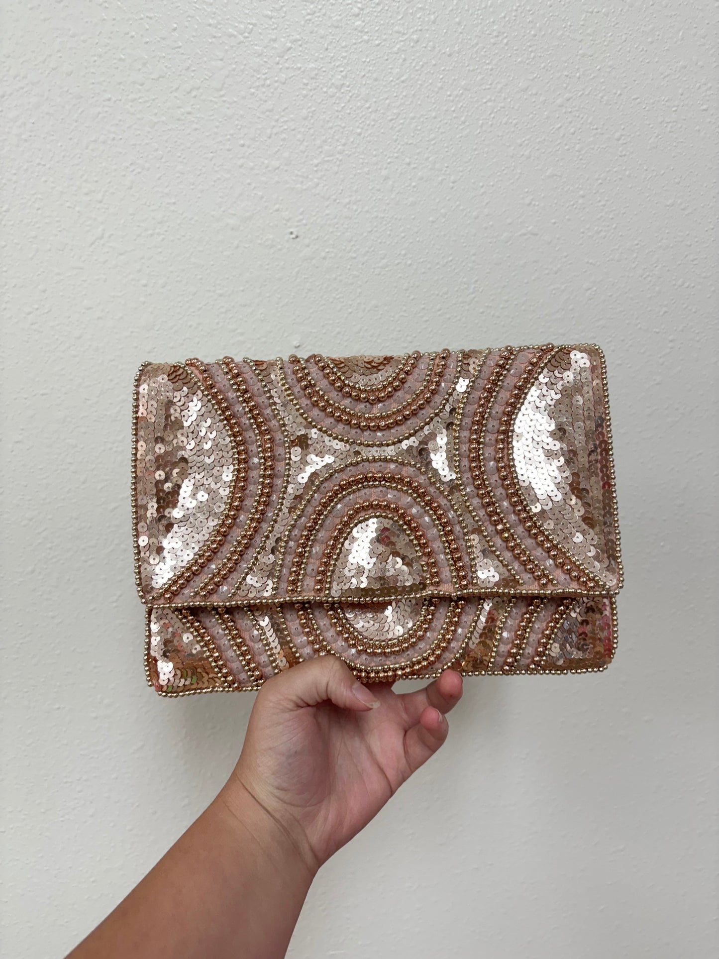 Oval Textured Rose Gold Clutch